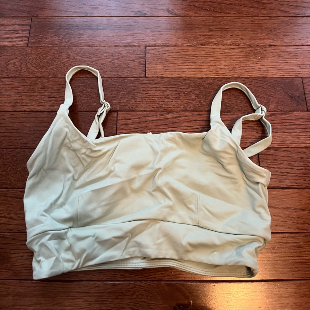 Very gently used green balance sports bra